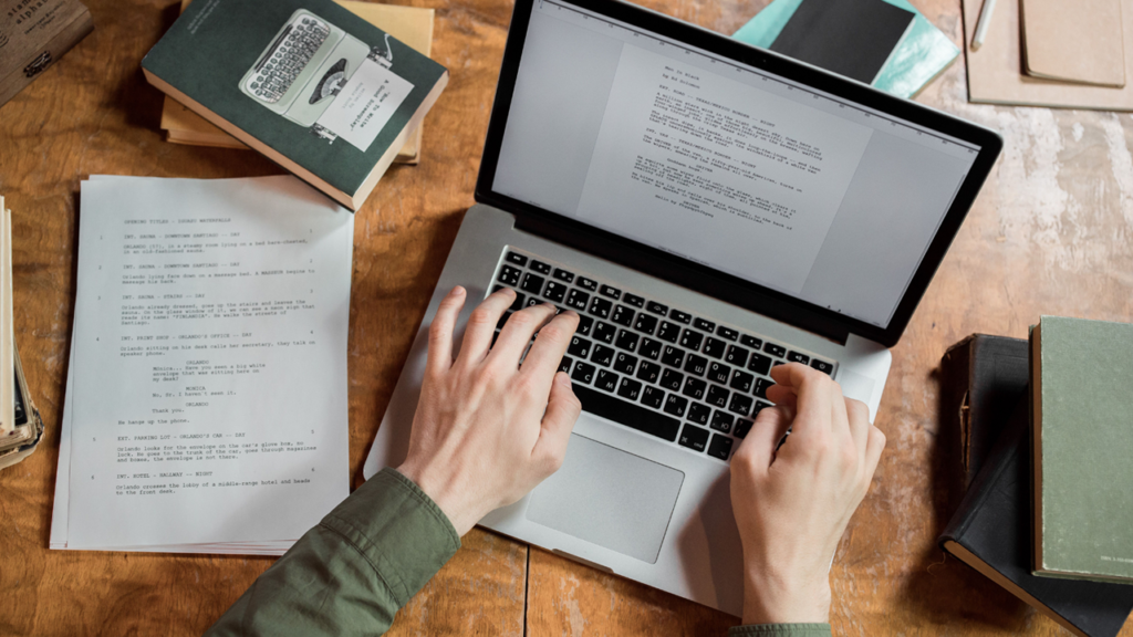 somone working on a laptop at a desk